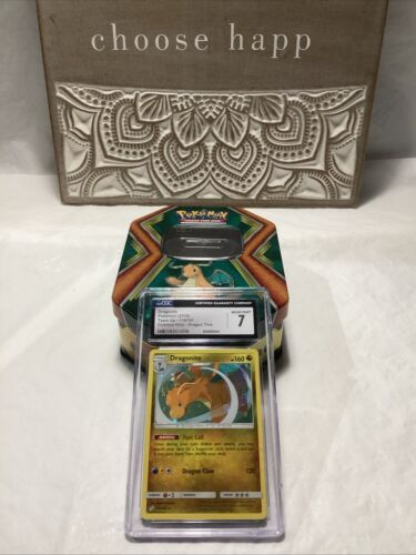 Pokemon Champions Dragonite Tin Opened Empty & Cosmos Holo 119/181 CGC 7 NM